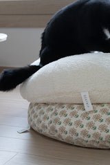 Tuxedo cat sitting on Ocatnip's Marshmallow Pudding Bed